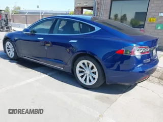 2016 Tesla Model S 90D with VIN 5YJSA1E25GF157220, listed as a IAAI auction lot 42003019 with 130,540 mi miles and . Bid and sale history available at DreamBid. Image 3.