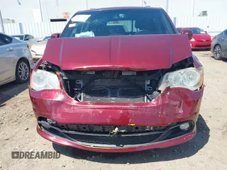 2017 Dodge Grand Caravan SXT with VIN 2C4RDGCG6HR581664, listed as a IAAI auction lot 41986539 with 111,164 mi miles and . Bid and sale history available at DreamBid. Image 6.