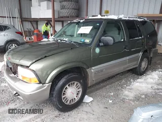 2001 GMC Jimmy SLE with VIN 1GKDT13W212171101, listed as a IAAI auction lot 41546523 with 229,471 mi miles. Bid and sale history available at carsss.com. Image 2.