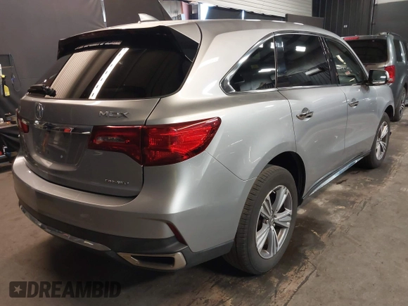 2020 Acura MDX with VIN 5J8YD4H32LL026682, listed as a IAAI auction lot 41977292 with 80,009 mi miles and . Bid and sale history available at DreamBid. Image 4.