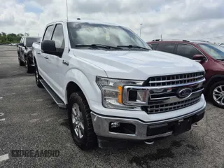 2018 Ford F-150 XL with VIN 1FTEW1E57JKF37999, listed as a IAAI auction lot 42240766 with 159,287 mi miles and . Bid and sale history available at carsss.com. Image 2.