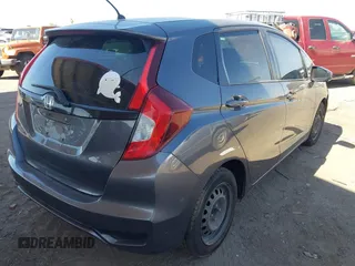 2018 Honda Fit LX with VIN 3HGGK5H51JM731851, listed as a IAAI auction lot 42570144 with 69,236 mi miles and . Bid and sale history available at DreamBid. Image 4.