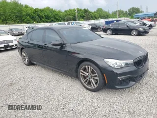 2018 BMW 7 Series 740e xDrive with VIN WBA7J2C59JB246238, listed as a Copart auction lot 53777335 with 76,642 mi miles and Salvage Title. Bid and sale history available at carsss.com. Image 4.
