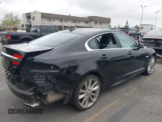 2015 Jaguar XF V6 Portfolio with VIN SAJWA0F77F8U65737, listed as a IAAI auction lot 42078529 with 62,229 mi miles. Bid and sale history available at carsss.com. Image 4.