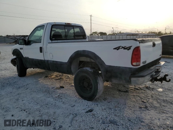 2000 Ford Super Duty F-250 XL with VIN 1FTNF21F7YEA97991, listed as a Copart auction lot 54577544 with 82,036 mi miles and Salvage Title. Bid and sale history available at carsss.com. Image 2.