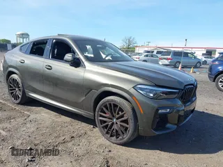 2021 BMW X6 sDrive40i z VIN 5UXCY4C06M9F26841, wystawiony jako IAAI lot #42122749 z przebiegiem 10 072 mil mil oraz . Historia ofert i sprzedaży dostępna na DreamBid. Obrazek 1.