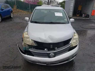 2008 Nissan Versa 1.8 SL with VIN 3N1BC13E28L395359, listed as a IAAI auction lot 41977799 with 80,258 mi miles. Bid and sale history available at carsss.com. Image 6.