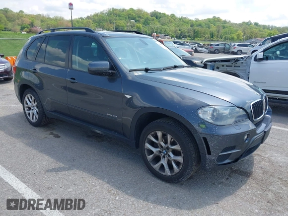 2011 BMW X5 35i with VIN 5UXZV4C57BL739907, listed as a IAAI auction lot 42135572 with 0 mi miles. Bid and sale history available at carsss.com. Image 1.