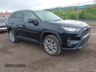 2021 Toyota RAV4 XLE Premium with VIN JTMA1RFV8MD069137, listed as a IAAI auction lot 42371437 with 25,602 mi miles and . Bid and sale history available at DreamBid. Image 1.