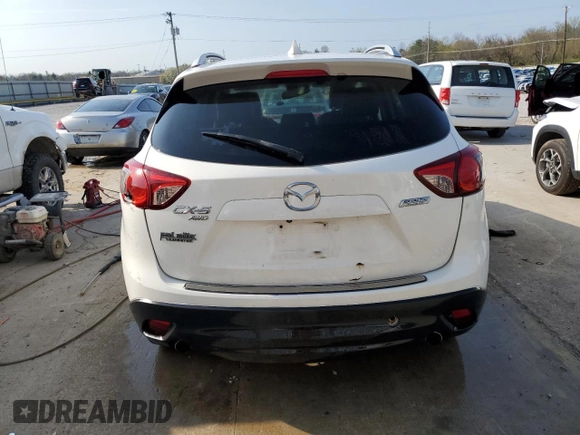 2014 Mazda CX-5 Grand Touring with VIN JM3KE4DY3E0327895, listed as a Copart auction lot 51073305 with 233,938 mi miles and Non Repairable. Bid and sale history available at carsss.com. Image 6.