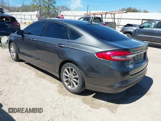 2017 Ford Fusion SE with VIN 3FA6P0H79HR198571, listed as a IAAI auction lot 41700901 with 159,386 mi miles and . Bid and sale history available at carsss.com. Image 3.