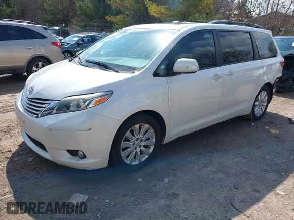 2016 Toyota Sienna XLE with VIN 5TDYK3DC5GS700459, listed as a IAAI auction lot 41905607 with Not provided miles and . Bid and sale history available at DreamBid. Image 22.