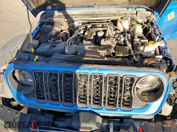 2024 Jeep Wrangler Rubicon z VIN 1C4PJXCG1RW298288, wystawiony jako Copart lot #81371914 z przebiegiem 4 445 mil mil oraz Szkoda całkowita • Salvage title. Historia ofert i sprzedaży dostępna na DreamBid. Obrazek 13.