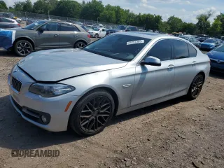 2015 BMW 5 Series 528i xDrive with VIN WBA5A7C54FD621811, listed as a Copart auction lot 65257305 with 104,470 mi miles and Salvage title. Bid and sale history available at DreamBid. Image 1.