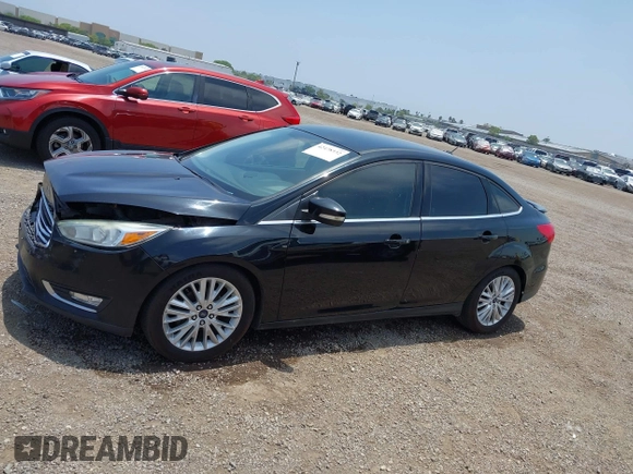 2016 Ford Focus Titanium z VIN 1FADP3J20GL310467, wystawiony jako IAAI lot #42478332 z przebiegiem 214 479 mil mil oraz . Historia ofert i sprzedaży dostępna na DreamBid. Obrazek 14.