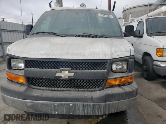 2014 Chevrolet Express Cargo Van with VIN 1GCWGFCB0E1133140, listed as a Copart auction lot 45433475 with 63,580 mi miles and Clean Title. Bid and sale history available at carsss.com. Image 5.