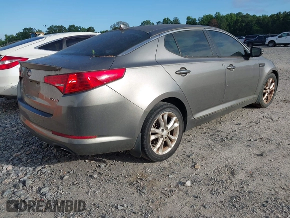 2013 Kia Optima EX with VIN 5XXGN4A73DG091000, listed as a IAAI auction lot 42555576 with 190,848 mi miles and . Bid and sale history available at DreamBid. Image 4.