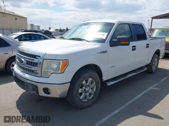 2014 Ford F-150 XL with VIN 1FTFW1CT8EKF55164, listed as a IAAI auction lot 42111483 with 233,166 mi miles. Bid and sale history available at carsss.com. Image 2.