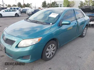 2010 Toyota Corolla with VIN JTDBU4EE4A9104965, listed as a IAAI auction lot 41956372 with 206,535 mi miles. Bid and sale history available at carsss.com. Image 2.