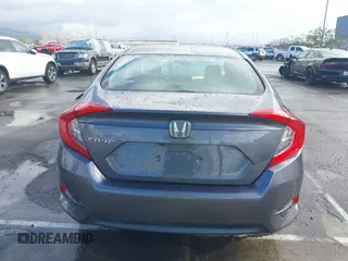 2017 Honda Civic LX z VIN 2HGFC2F50HH540361, wystawiony jako IAAI lot #41809159 z przebiegiem 96 590 mil mil oraz . Historia ofert i sprzedaży dostępna na DreamBid. Obrazek 17.