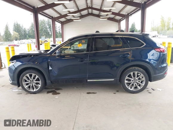 2018 Mazda CX-9 Grand Touring with VIN JM3TCBDY0J0216195, listed as a IAAI auction lot 41976122 with 90,083 mi miles and . Bid and sale history available at DreamBid. Image 14.