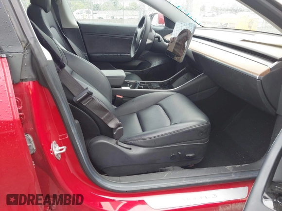 2018 Tesla Model 3 Long Range Battery with VIN 5YJ3E1EA6JF052659, listed as a IAAI auction lot 42093903 with 49,255 mi miles and . Bid and sale history available at DreamBid. Image 5.
