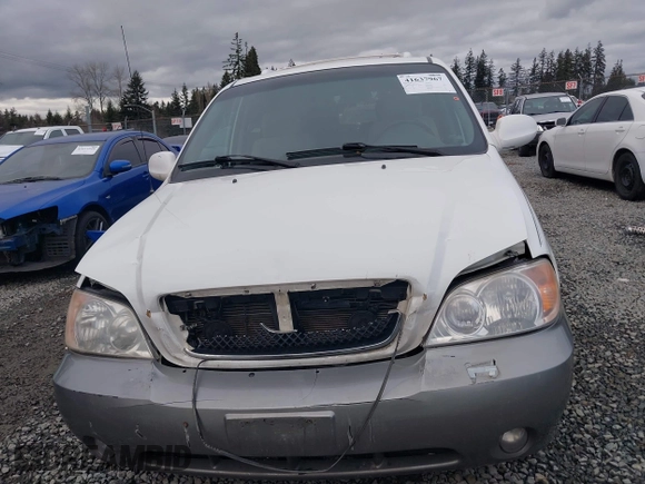 2005 Kia Sedona LX with VIN KNDUP132X56742698, listed as a IAAI auction lot 41637967 with 118,346 mi miles. Bid and sale history available at carsss.com. Image 6.