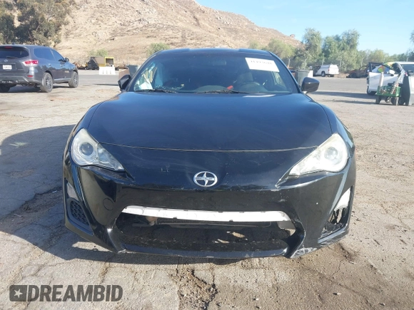 2015 Scion FR-S z VIN JF1ZNAA14F9703780, wystawiony jako IAAI lot #41493648 z przebiegiem 125 997 mil mil oraz . Historia ofert i sprzedaży dostępna na DreamBid. Obrazek 13.