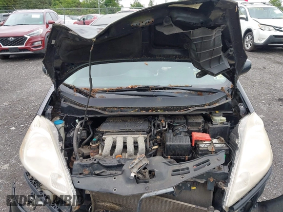 2009 Honda Fit Sport with VIN JHMGE88469S055316, listed as a IAAI auction lot 42306333 with 144,377 mi miles and . Bid and sale history available at DreamBid. Image 10.
