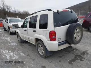 2004 Jeep Liberty Limited with VIN 1J4GL58K04W118653, listed as a IAAI auction lot 41369158 with 169,084 mi miles. Bid and sale history available at carsss.com. Image 3.