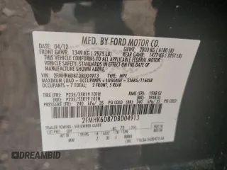 2013 Ford Flex Limited z VIN 2FMHK6D87DBD04913, wystawiony jako Copart lot #52798105 z przebiegiem 122 614 mil mil oraz Czysty tytuł • Clean title. Historia ofert i sprzedaży dostępna na DreamBid. Obrazek 13.