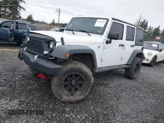 2017 Jeep Wrangler Unlimited Sport with VIN 1C4BJWDG2HL520081, listed as a IAAI auction lot 41916923 with 73,592 mi miles. Bid and sale history available at carsss.com. Image 2.