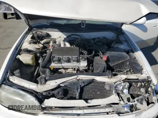 1996 Toyota Camry LE z VIN JT2BF12K3T0139807, wystawiony jako Copart lot #57675855 z przebiegiem 258 601 mil mil oraz Szkoda całkowita • Salvage title. Historia ofert i sprzedaży dostępna na DreamBid. Obrazek 11.