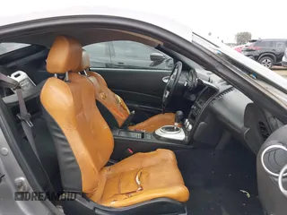 2006 Nissan 350Z Touring z VIN JN1AZ34D86M312841, wystawiony jako IAAI lot #42336869 z przebiegiem 138 191 mil mil oraz . Historia ofert i sprzedaży dostępna na DreamBid. Obrazek 5.