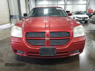 2005 Dodge Magnum RT z VIN 2D8GV58275H682558, wystawiony jako Copart lot #72698124 z przebiegiem 169 923 mil mil oraz Szkoda całkowita • Salvage title. Historia ofert i sprzedaży dostępna na DreamBid. Obrazek 5.