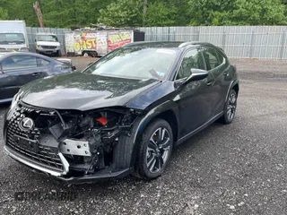 2025 Lexus UX 300h with VIN JTHUCJDH8S2003698, listed as a Copart auction lot 56182345 with 1,111 mi miles and Salvage Title. Bid and sale history available at DreamBid. Image 2.