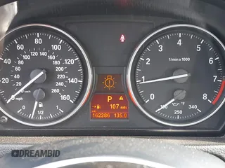 2009 BMW 3 Series 335i xDrive with VIN WBAWC73519E068984, listed as a IAAI auction lot 42054771 with 162,386 mi miles and . Bid and sale history available at carsss.com. Image 7.