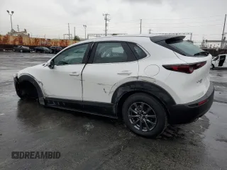 2023 Mazda CX-30 S with VIN 3MVDMBAM4PM522056, listed as a Copart auction lot 49122975 with 16,624 mi miles and Salvage title. Bid and sale history available at DreamBid. Image 2.