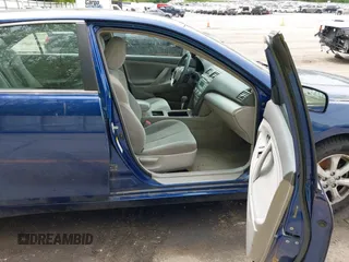 2009 Toyota Camry z VIN 4T1BE46K09U290607, wystawiony jako IAAI lot #42378997 z przebiegiem 214 501 mil mil oraz . Historia ofert i sprzedaży dostępna na DreamBid. Obrazek 5.