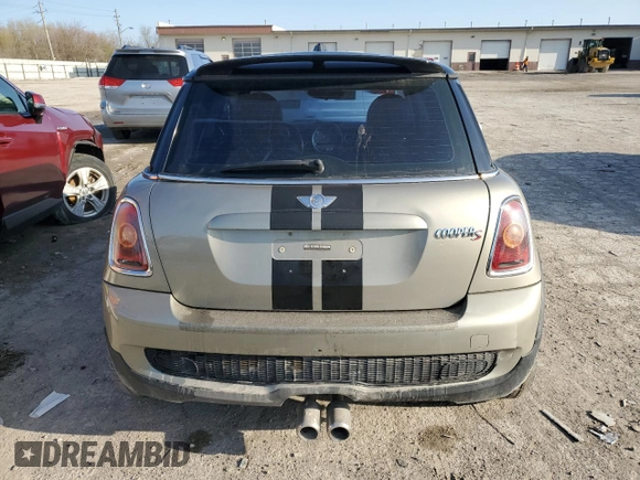 2009 MINI Hardtop S with VIN WMWMF73529TW82713, listed as a Copart auction lot 51152035 with 170,954 mi miles and Salvage title. Bid and sale history available at DreamBid. Image 6.