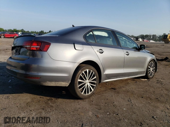 2016 Volkswagen Jetta Sport z VIN 3VWD17AJ3GM242719, wystawiony jako Copart lot #62234275 z przebiegiem 73 394 mil mil oraz Szkoda całkowita • Salvage title. Historia ofert i sprzedaży dostępna na DreamBid. Obrazek 3.