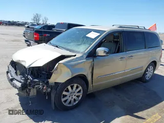 2011 Chrysler Town & Country Touring L with VIN 2A4RR8DG6BR781922, listed as a IAAI auction lot 42042313 with 155,612 mi miles and . Bid and sale history available at carsss.com. Image 2.