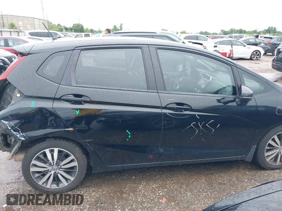 2015 Honda Fit EX-L with VIN 3HGGK5H89FM779891, listed as a IAAI auction lot 42492123 with 167,150 mi miles and . Bid and sale history available at DreamBid. Image 14.