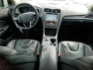 2019 Ford Fusion Titanium z VIN 3FA6P0RU4KR211674, wystawiony jako Copart lot #62205885 z przebiegiem 313 261 mil mil oraz Szkoda całkowita • Salvage title. Historia ofert i sprzedaży dostępna na DreamBid. Obrazek 8.