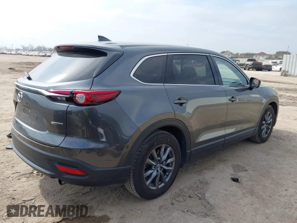 2021 Mazda CX-9 Touring with VIN JM3TCACY7M0516185, listed as a IAAI auction lot 41524084 with 53,084 mi miles. Bid and sale history available at carsss.com. Image 4.