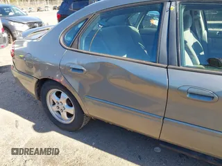 2004 Ford Taurus SE with VIN 1FAFP53224G197451, listed as a IAAI auction lot 41224109 with 290,224 mi miles and . Bid and sale history available at DreamBid. Image 12.
