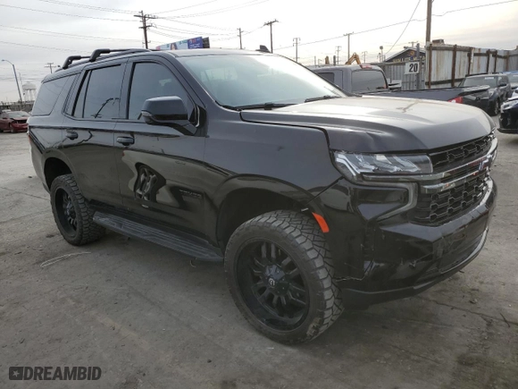 2022 Chevrolet Tahoe RST with VIN 1GNSKRKL9NR244044, listed as a Copart auction lot 84672734 with 33,845 mi miles and Salvage Title. Bid and sale history available at carsss.com. Image 4.
