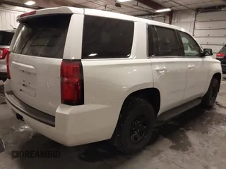 2020 Chevrolet Tahoe Commercial z VIN 1GNSKDECXLR260202, wystawiony jako IAAI lot #41608712 z przebiegiem 137 214 mil mil oraz . Historia ofert i sprzedaży dostępna na DreamBid. Obrazek 4.