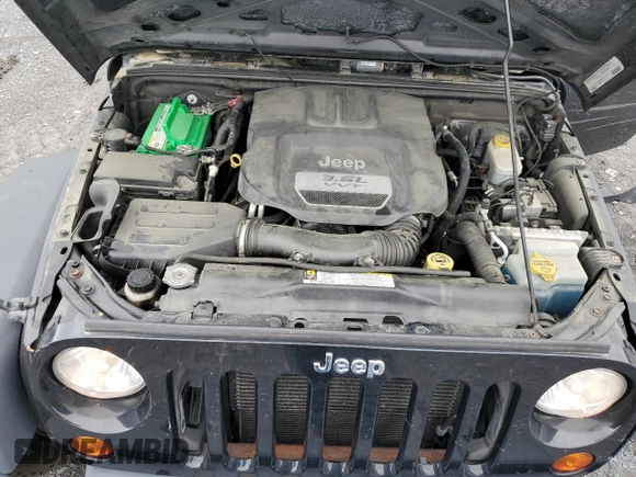 2012 Jeep Wrangler Unlimited Sport z VIN 1C4BJWDG9CL102626, wystawiony jako Copart lot #58421455 z przebiegiem 128 421 mil mil oraz Szkoda całkowita • Salvage title. Historia ofert i sprzedaży dostępna na DreamBid. Obrazek 12.