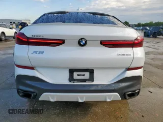 2023 BMW X6 xDrive40i z VIN 5UXCY6C08P9N43749, wystawiony jako Copart lot #54092795 z przebiegiem 39 495 mil mil oraz Szkody całkowita. Historia ofert i sprzedaży dostępna na DreamBid. Obrazek 6.